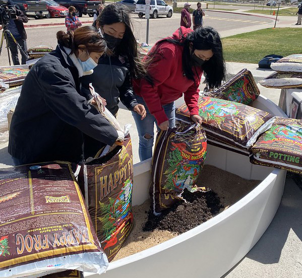 Bruce Randolph School students install an outdoor garden as part of the school's AgConnect Pathway program.