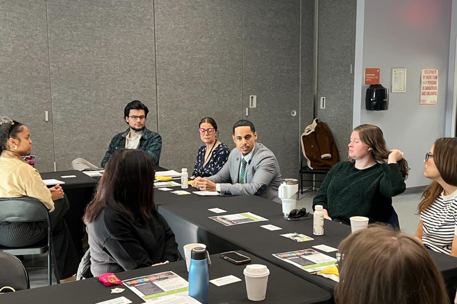 Center: Curtis Turney-Rentas, Director of the B.R.I.D.G.E. Family Enrichment Center and founder of the Far Rock Greek Council.